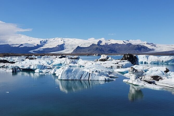 2-Day Blue Ice Cave, Glacier Lagoon and South Coast - Small Group - Day one: waterfalls, volcano views, and the black coast