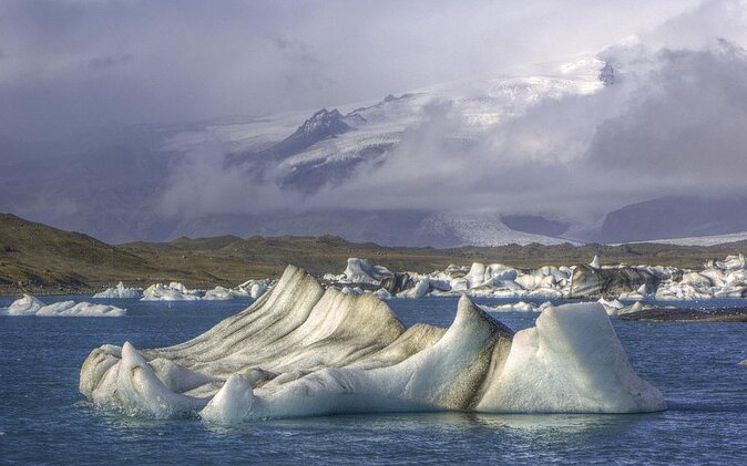 2-Day South Coast Waterfalls, Jokulsarlon Glacier Lagoon and Hike from Reykjavik - Skógafoss and the black sand at Reynisfjara
