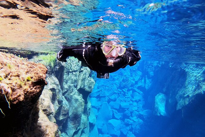 Cold & Hot: Adventure Spa Tour Combo: Silfra & Sky Lagoon Self-Drive - Snorkeling through Silfra’s clear water