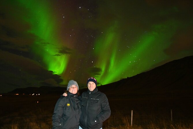 From Reykjavik 4x4 Minibus Northern Lights with Photo and Cocoa - Getting a professional photo beneath the lights