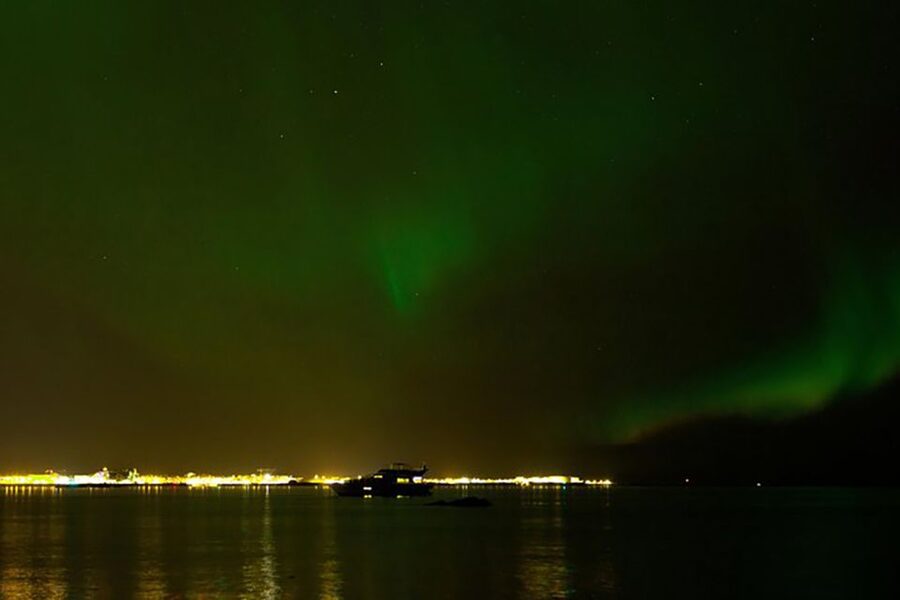 From Reykjavik: New Years Fireworks by Boat - The coastline and fireworks from Faxaflói bay