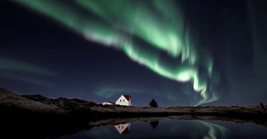 From Reykjavik: Northern Lights Tour with Hot Cocoa & Photos - Chasing the aurora instead of waiting in town