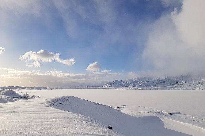 Frozen Wonders : Small Group Ice Cave Tour - Helmets, crampons, and glacier footing