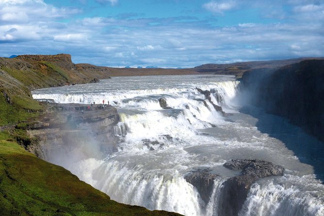 Golden Circle and Glacier Snowmobiling Day Trip from Reykjavik - Geysir: expect bursts, steam, and waiting