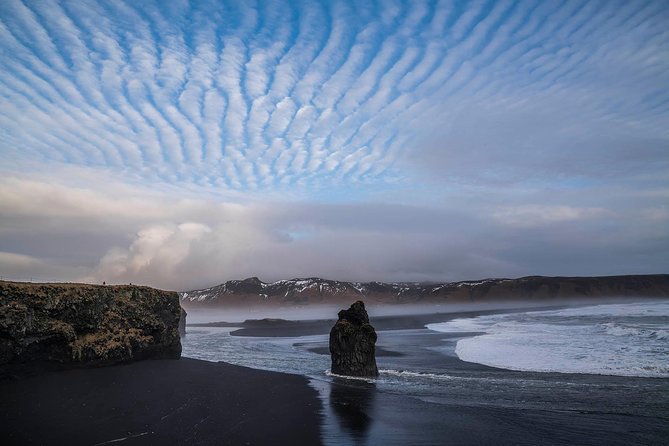 Iceland's South Coast Full Day Tour from Reykjavik - Sólheimajökull Glacier: ice beside the road