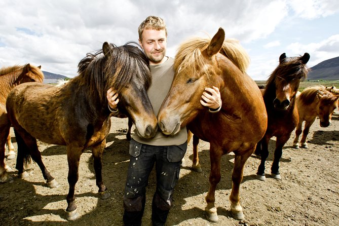 Icelandic Horseback Riding Tour Including Pick Up from Reykjavik - Getting fitted with helmets, boots, and coveralls