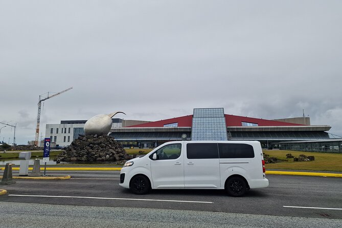 Keflavik Airport Private Transfer Round Trip - Landing at Keflavik Airport with a driver waiting