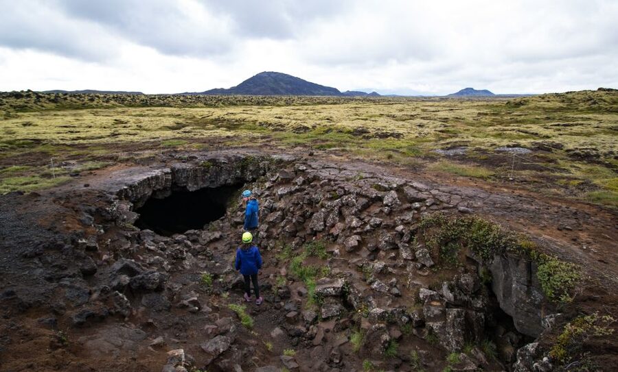 Leidarendi Cave: Lava Tunnel Caving from Reykjavik - Entering Leidarendi’s pitch-black lava tube