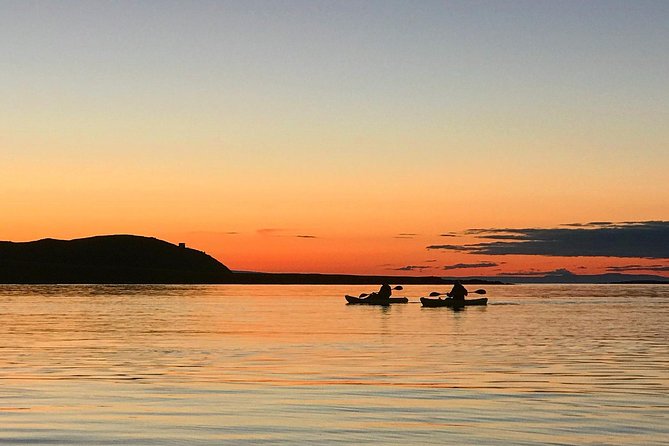 Midnight Sun Kayaking Adventure by Mt. Kirkjufell - A three-hour paddle beside Mt. Kirkjufell