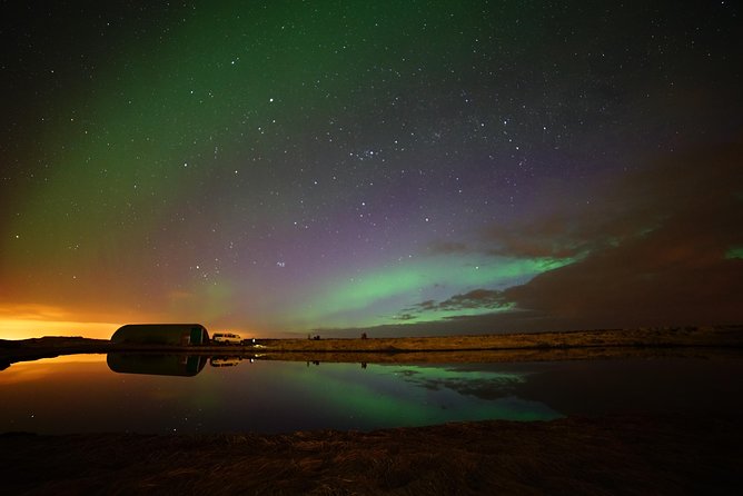 Northern Lights Minibus Tour with Hot Cocoa, Blankets & Photos - Free photos, phone cameras, and sensible expectations