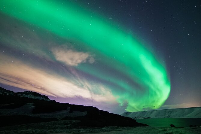 Northern Lights Minibus Tour with Hot Cocoa, Blankets & Photos - Pickup timing and the four-hour schedule