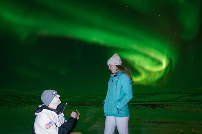Northern Lights Private Guided Tour With Professional Photos - Waiting beneath the aurora