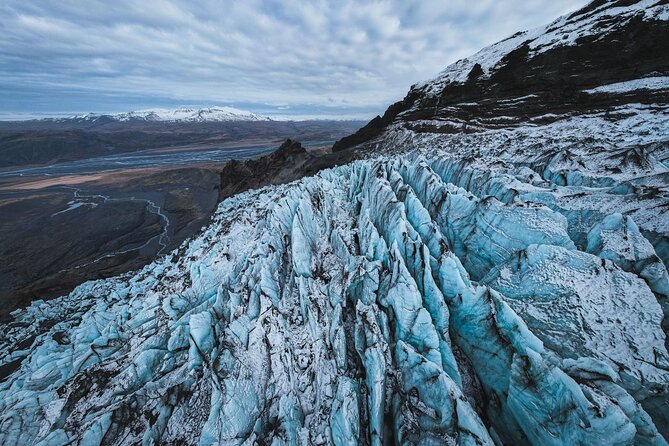 Private South Coast with Glacier Hike in Iceland - Reynisfjara Beach: beautiful, dramatic, and serious