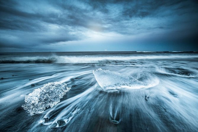 Reykjavik: Glacier Lagoon, Diamond Beach & South Coast Day Tour - Vik offers black sand and sea stacks