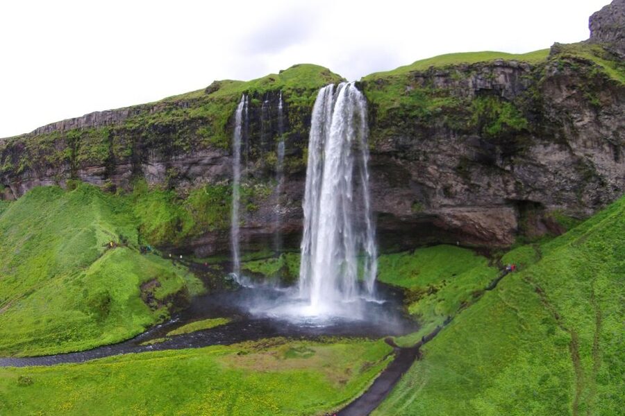Reykjavik: Iceland South Coast & Glacier Snowmobile Tour - Skógafoss: a powerful stop on the way back