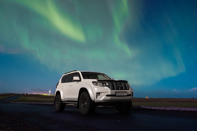 Reykjavik Private Northern Lights Tour with Pro Photographer - From Reykjavik pickup to the first dark-sky stop