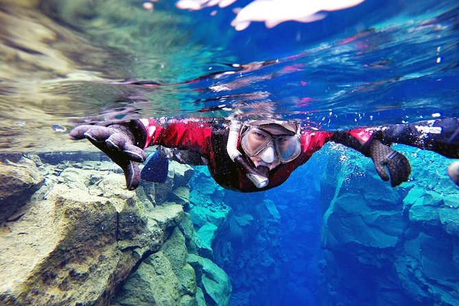 Silfra Drysuit Snorkeling Tour with Free Photos - From Reykjavik - What the $189 price really buys you