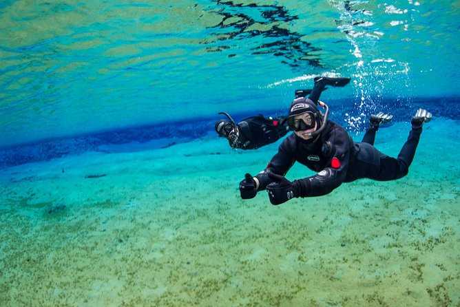 Silfra Fissure Snorkeling From Reykjavík - Free Underwater Photos - Getting into the dry suit is the hardest part