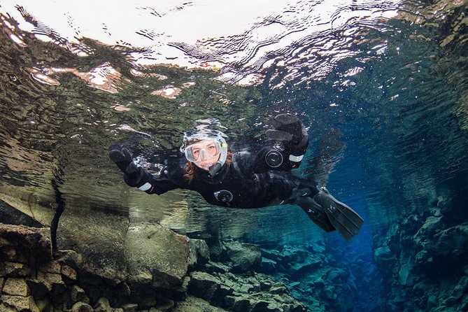 Silfra: Hot and Cold Snorkeling and Spa Tour - Self Drive - Warming up with hot chocolate and cookies