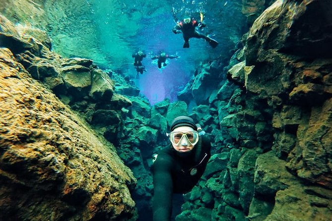 Silfra Wetsuit Snorkeling - Meet on Location | Free Photos - The safety briefing sets the tone
