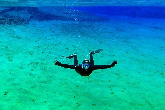 Silfra Wetsuit Snorkeling Tour with Underwater Photos - From Reykjavik - Who should choose this experience?