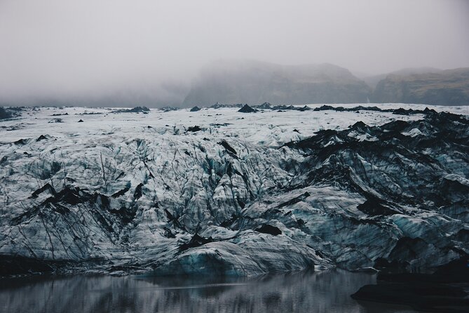 South Coast, Waterfalls and Black Sand Beach (Small Group Tour) - Sólheimajökull and Iceland’s world of ice
